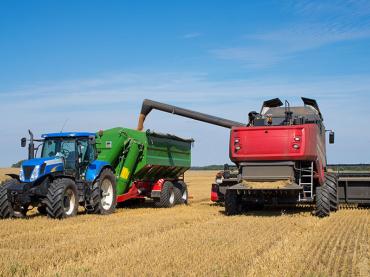 Two trucks harvesting